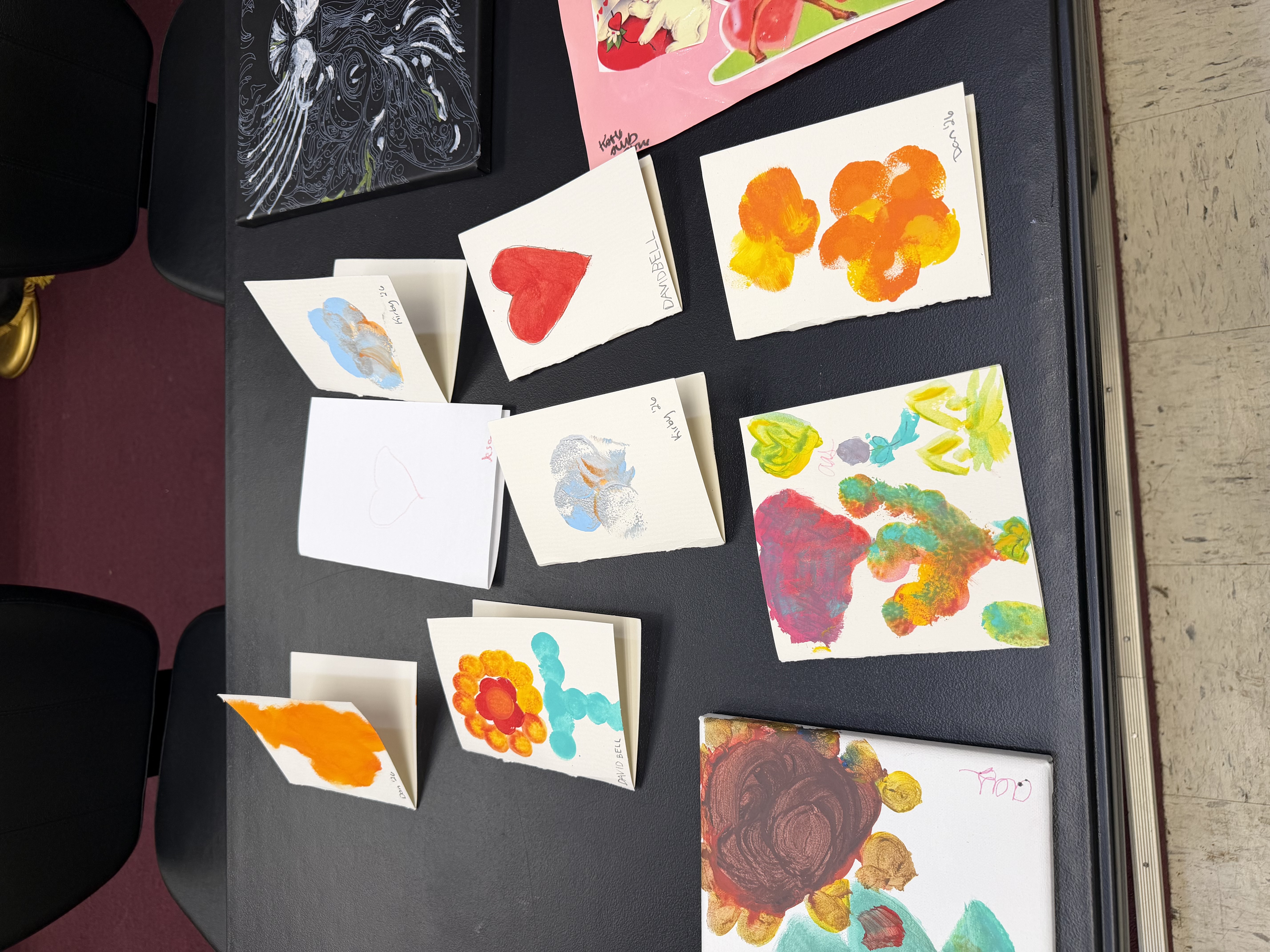 Painted artwork and cards made by participants