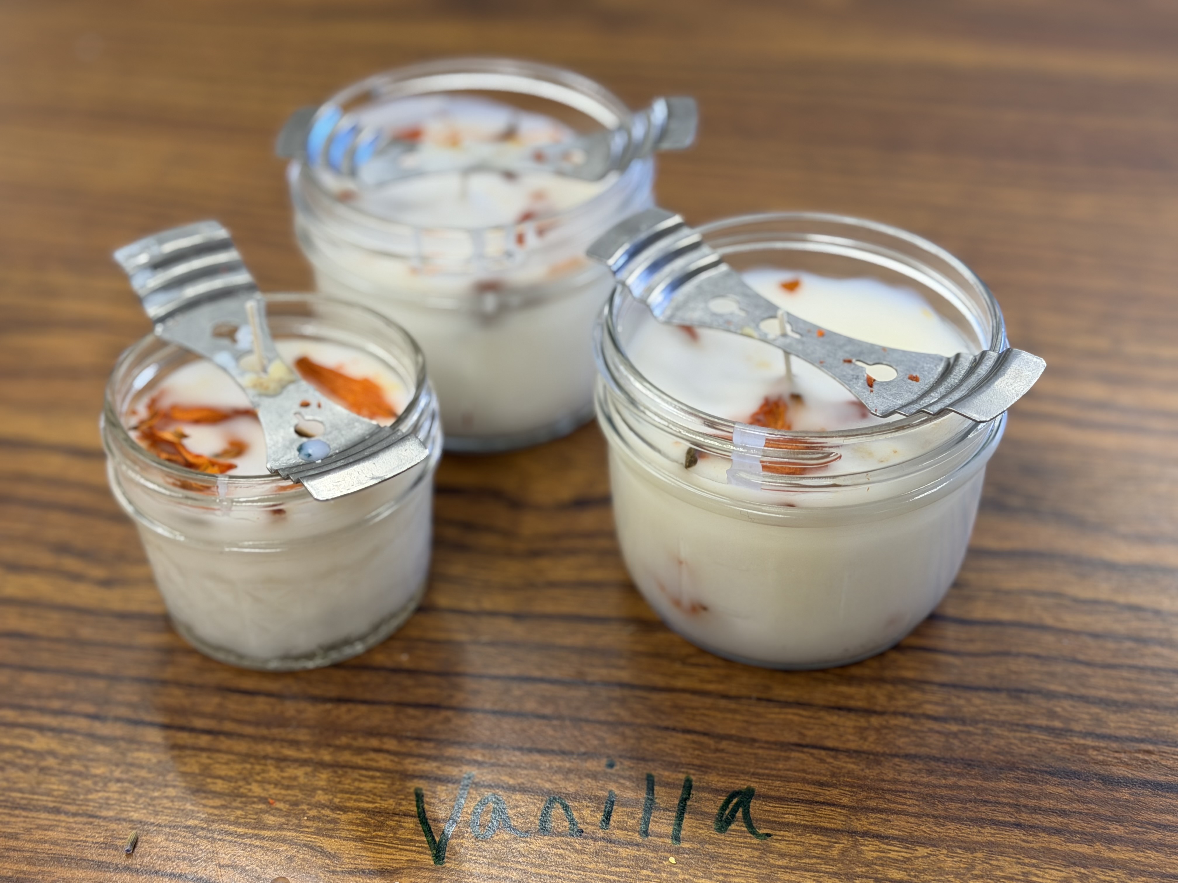 Handmade candles crafted by participants